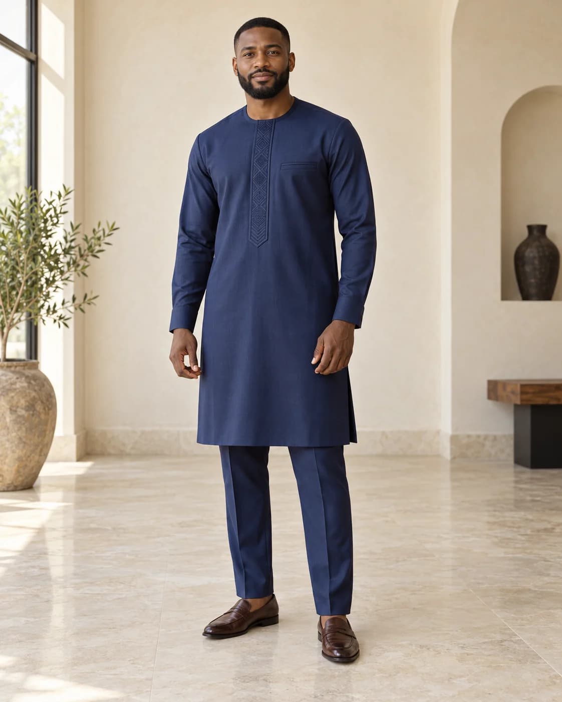 Finished navy kaftan with tonal detailing and matching trousers